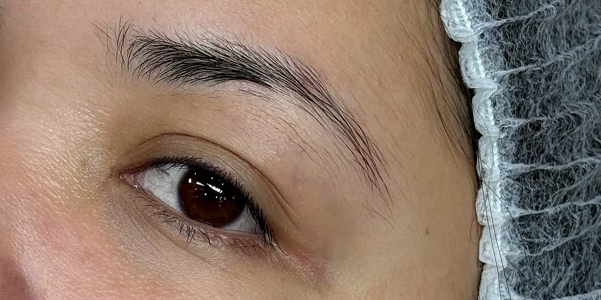Before: the same brow before Nano Brows, with a sparse tail